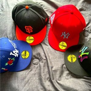4 New Era Hats, still in great condition!